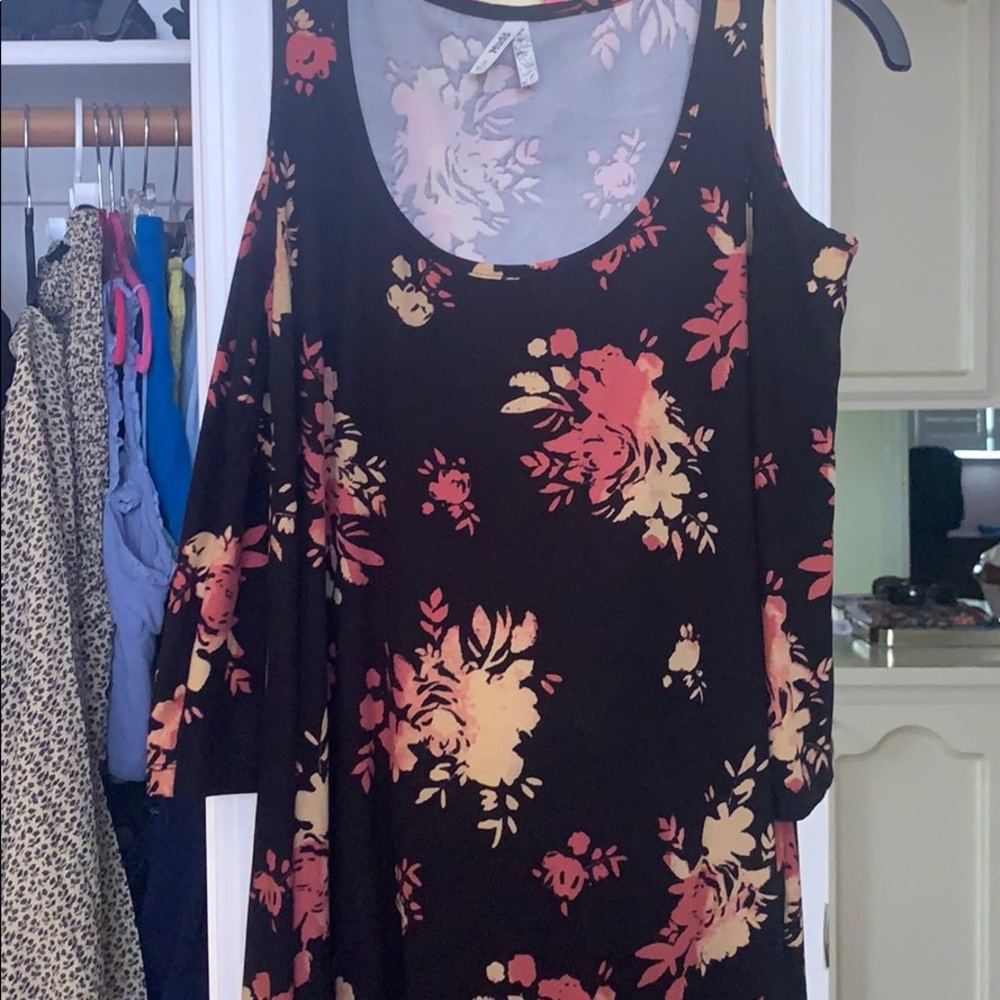 A floral off shoulder dress